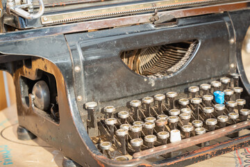Old typewriter for text. In the dust.