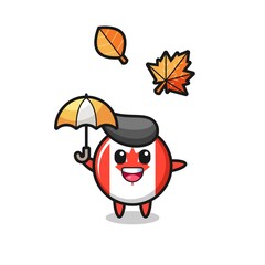 cartoon of the cute canada flag badge holding an umbrella in autumn