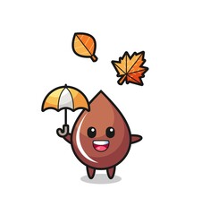 Obraz premium cartoon of the cute chocolate drop holding an umbrella in autumn