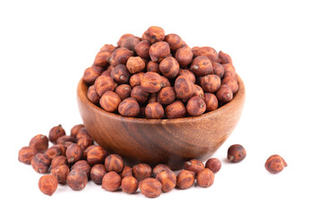 Pile of brown chickpeas in wooden bowl, isolated on white background. Brown chickpea. Garbanzo, bengal gram or chick pea bean.