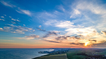 Aerial view of sunset by the Brighton, Rottingdean with view of cliffs.