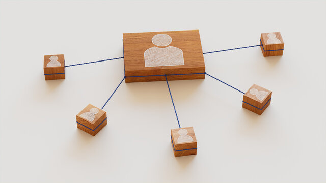 Social Technology Concept with user Symbol on a Wooden Block. User Network Connections are Represented with Blue string. White background. 3D Render.