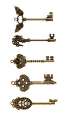 old brass key against a white background