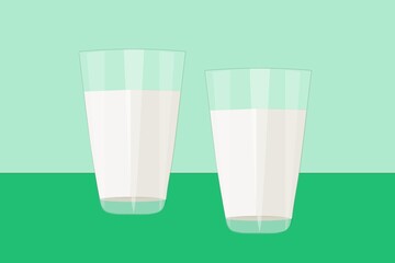 Glasses with milk on a background of green shades for the design of the menu, banner, advertisement, website about healthy nutrition, suitable for printing on paper, dishes, packaging