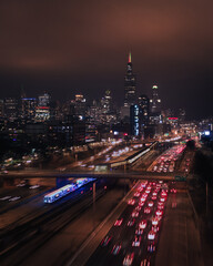 Fototapeta na wymiar Chicago Christmas Train with Skyline of City in the Winter