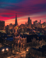 Church in Chicago at Sunrise Hours with Dramatic Aerial Skyline Views of the City