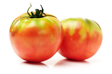 two tomatoes isolated