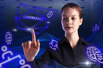 Business, Technology, Internet and network concept. Young businessman working on a virtual screen of the future and sees the inscription: Governance