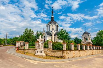 Church steeple and crucifixion . Orthodox church in village Donici from Moldova