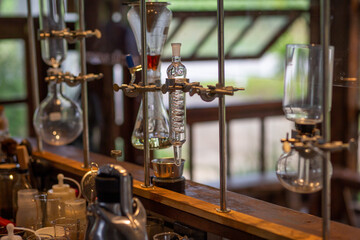 selective focus glass ampoules distillation experiment in the lab of coffee shop drink For the best coffee and beverages in Thailand