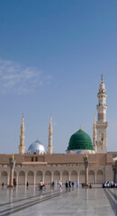 Pilgrims walk at the Nabawi Mosque compound  in Medina, Saudi Arabia. The mosque is the second holiest mosque in Islam.