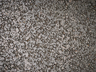 Natural textured wet asphalt grunge background, copy space
