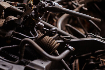 Obraz na płótnie Canvas Car motor parts. Auto motor mechanic spare or automotive piece on dark background