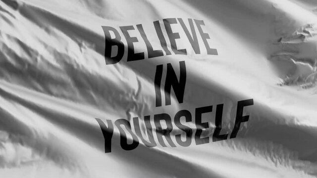 Believe In Yourself Flag 3d Render. Slow Motion Flag Fluttering In Wind. Inspirational. 4k Computer Generated Graphics. Self Help Health Animated Design. Black Text On White Background.