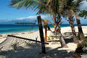Hammock on the beach at a resort in Fiji