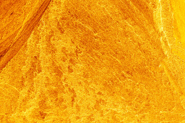 Gold stone texture for background. gold background