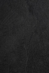 Dunkelgrauer schwarzer Schieferhintergrund oder -beschaffenheit. © peekeedee