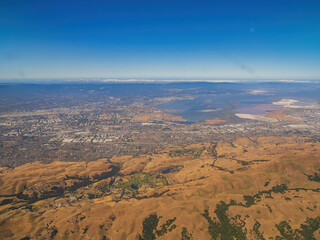 Fototapeta na wymiar Aerial view of the San Jose area and Ed R. Levin County Park