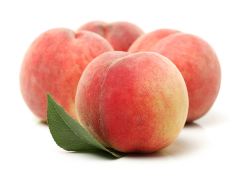 ripe peach on white background
