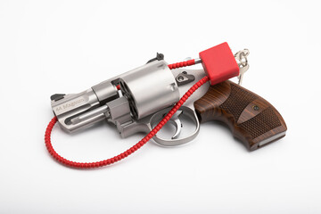 .44 magnum  with Locked disarmed and secured revolver gun on white background - obrazy, fototapety, plakaty