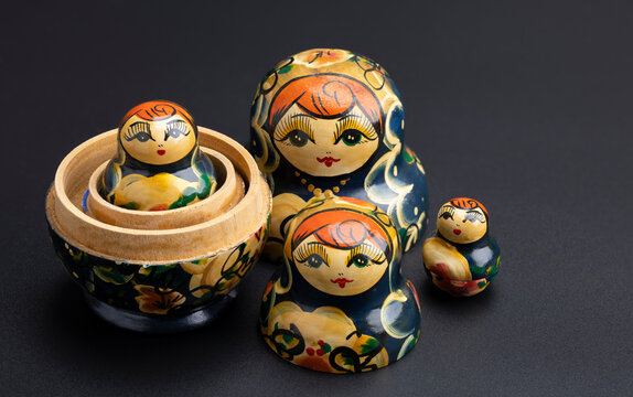 Traditional Russian doll on black background , Souvenirs for tourists