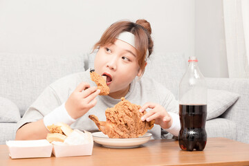 Asian fat girl drinking fried chicken