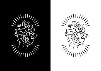 Black and white of hand holding heart badge