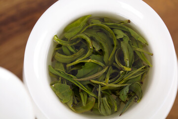 Green tea close-up in a tureen