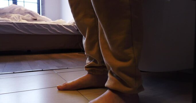 A woman goes to the toilet and sits on the toilet.The process of defecation. Toilet at home. Healthy bowel movements in the morning.