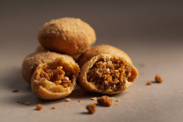 Close-up of freshly baked spicy Dry kachori or crunchy balls filled with spicy dry chutney traditionally authentic Rajasthani and Gujrati.