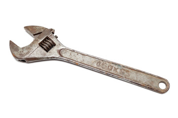 Old adjustable wrench isolated on white background 