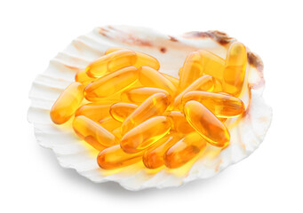 Sea shell with fish oil capsules on white background