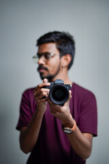 Fototapeta premium Photographer With Camera on white background.