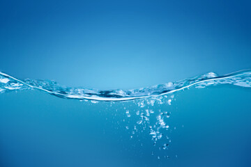 Water waves ,Splashed water wave in clean blue water.