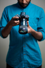 Fototapeta premium Photographer With Camera on white background.