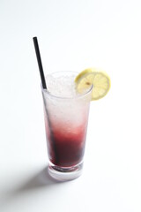 ice cold chilled fresh ribena grape lemon fruit honey drink in glass and yellow straw beverage menu in white background