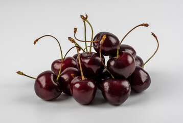Cherry isolated. Sour cherry. Cherries on white background. Sour cherries on white.