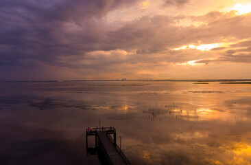Pier on Mobile Bay at sunset 