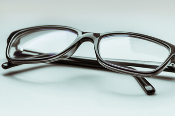 Stylish eyeglasses on the white background.