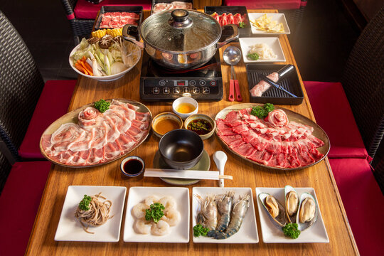 japanese hot pot set on wooden table.