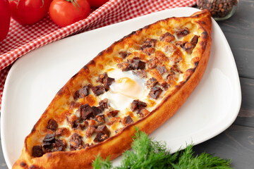 Close up of Turkish Pide bread on wooden table