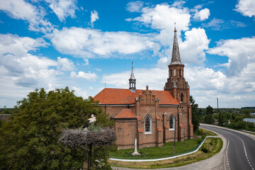 Fototapeta na wymiar Neo-Gothic Catholic Church of the Sacred Heart of Jesus in Stoyaniv, Ukraine. Aerial view from drone