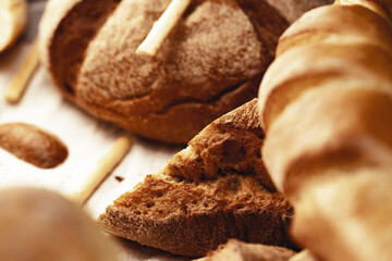 Cut bread assortment for a background, close up