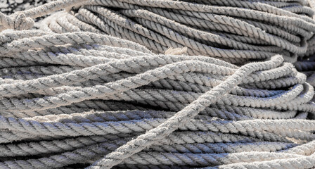 Fototapeta premium traditional fishing net and rope on small rowing boat