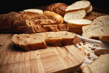 Cut bread assortment for a background, close up