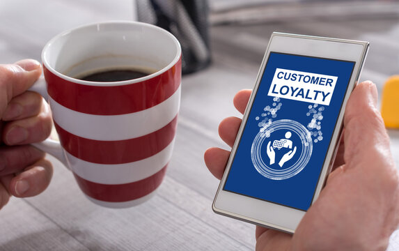 Customer loyalty concept on a smartphone - Powered by Adobe