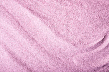 Fototapeta na wymiar Abstract bright pink sand texture with smooth waves. Fashion background.