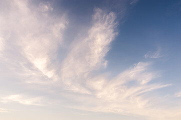 White cirrus clouds in a blue sky