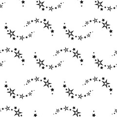 Fototapeta na wymiar Seamless cute pattern of falling black stars with trace on white background.