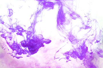 Obraz na płótnie Canvas Beautiful ink mix macro. Pink, purple, violet, white colors watercolor pouring. Paint movement macro. Fluid art painting. Moving flowing stream of liquid paint. Decorative abstract background.